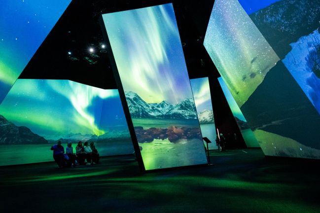 Screens showing the BBC Earth Experience