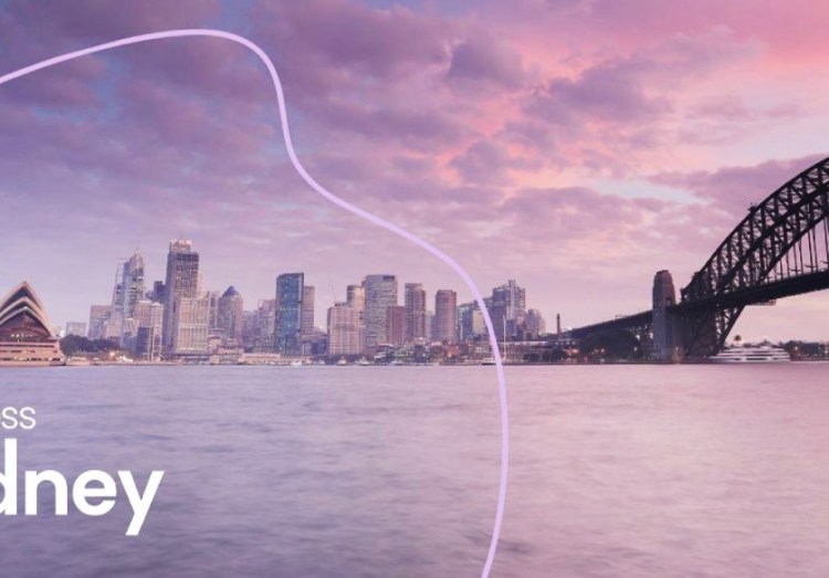 A photo of Sydney Harbour with the new BESydney branding