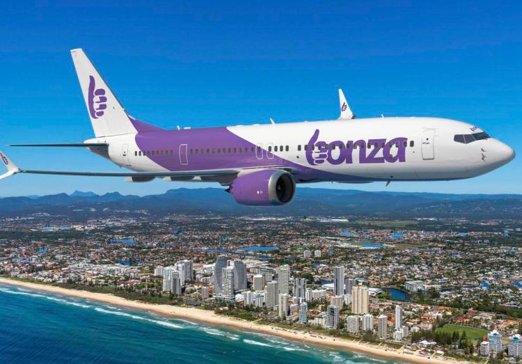 Bonza plane flies over the Australian coast.