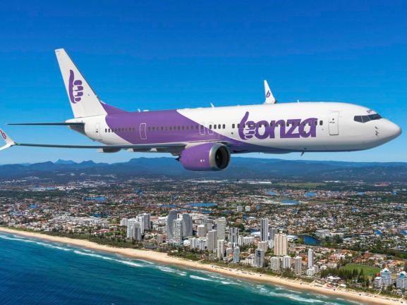 Bonza plane flies over the Australian coast.