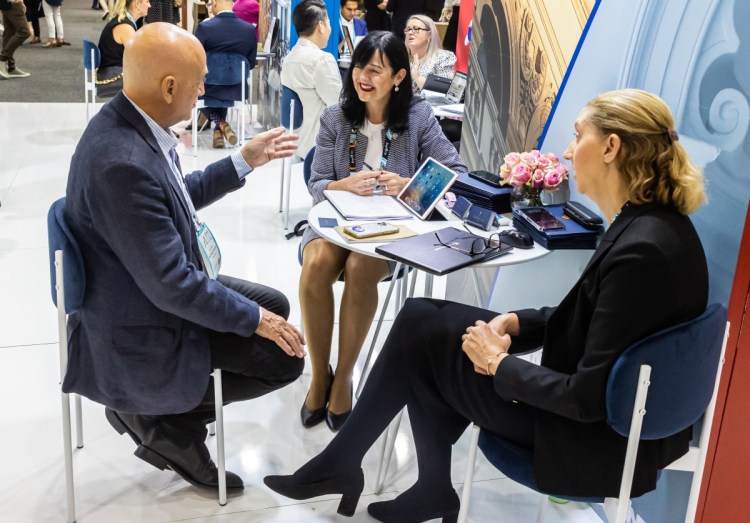 People having a meeting at AIME